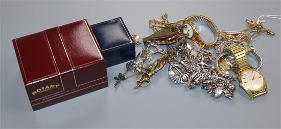 A group of mixed jewellery including a 9ct bar brooch, 18ct bar brooch, silver charm bracelet, watches and costume jewellery